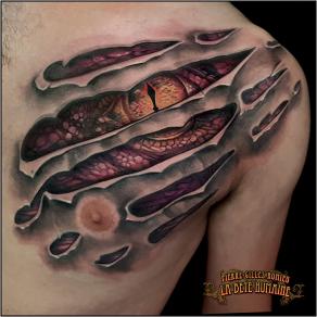 meilleur-tatoueur-paris-pierre-gilles-romieu-tatouage-tattoo-cover-dragon-dechirure